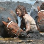 Race against the tide: Bravery of young mother who stayed by her horse's side for THREE HOURS after getting trapped in mud 'like quicksand'