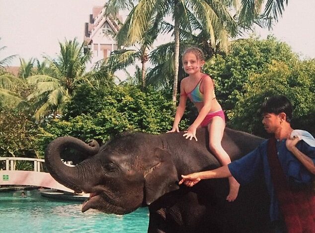 Amber Owen was on holiday in Thailand when the tsunami struck on Boxing Day 2004, and is seen here on the back of Ning Nong the elephant